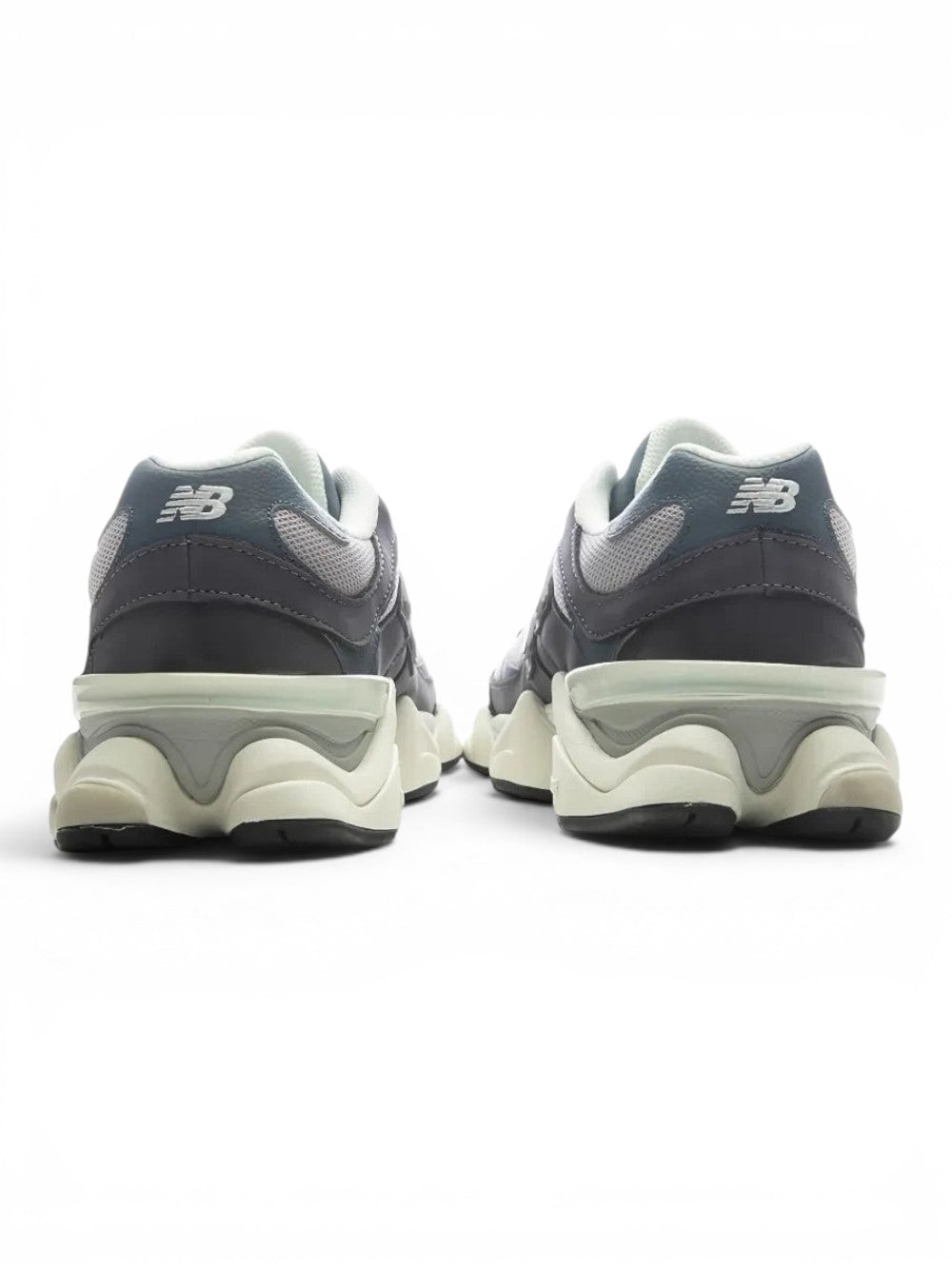 urbanstyle New Balance 9060 sneakers in charcoal and grey, showing the sculpted midsole and heel detail from behind.