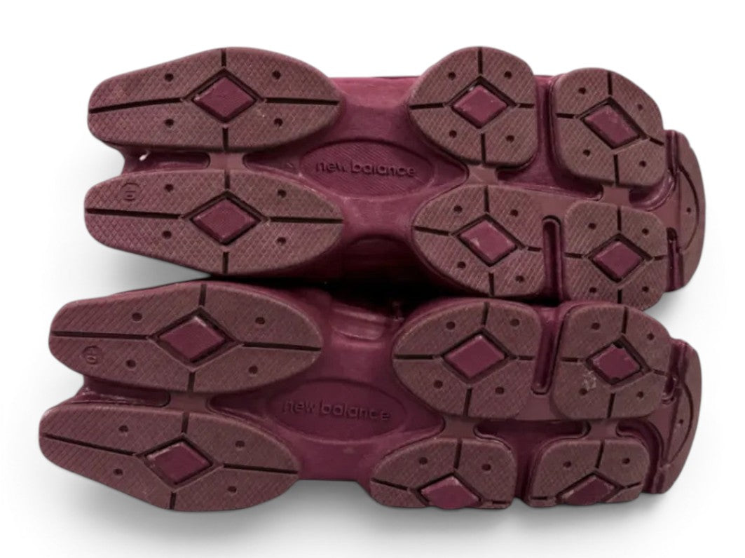 urbanstyle New Balance 9060 sneakers in burgundy showing the rugged rubber outsoles with a sculpted tread pattern
