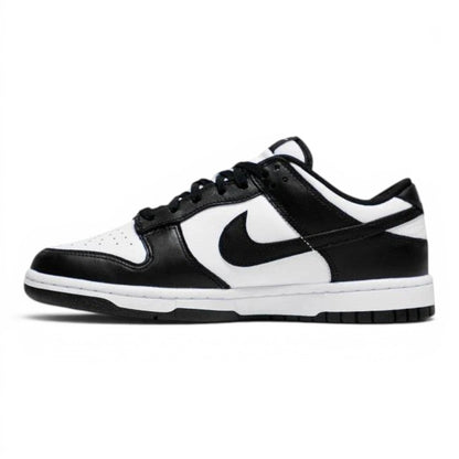 Urbanstyle black and white leather low top sneakers with Nike Swoosh detail.