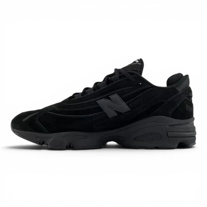 urbanstyle New Balance 1000 lifestyle running sneaker in monochromatic black suede and mesh with sculpted midsole.