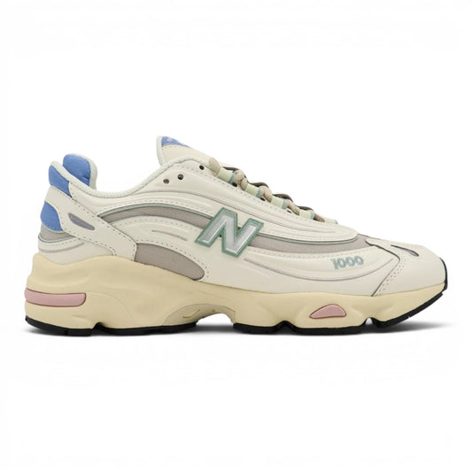 urbanstyle New Balance 1000 sneakers in off-white with pastel blue, green, and pink accents, featuring mesh and synthetic layers.