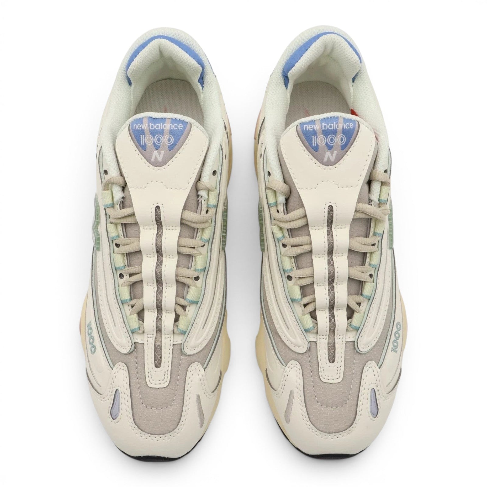 urbanstyle New Balance 1000 sneakers in off-white with pastel blue, green, and pink accents, featuring a layered mesh design
