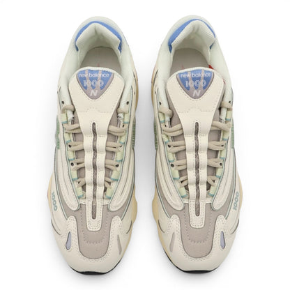 urbanstyle New Balance 1000 sneakers in off-white with pastel blue, green, and pink accents, featuring a layered mesh design