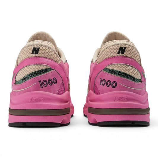 urbanstyle New Balance 1000 sneakers in pink, green, and beige, showing rear view with ABZORB branding and heel detail