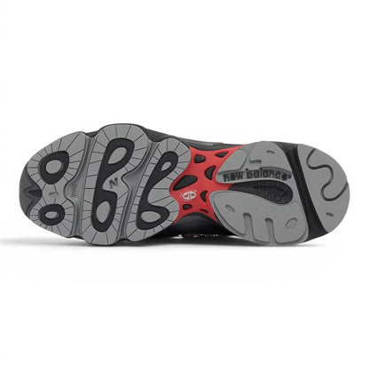 urbanstyle New Balance 1000 lifestyle running shoe outsole featuring grey, black, and red technical tread pattern.