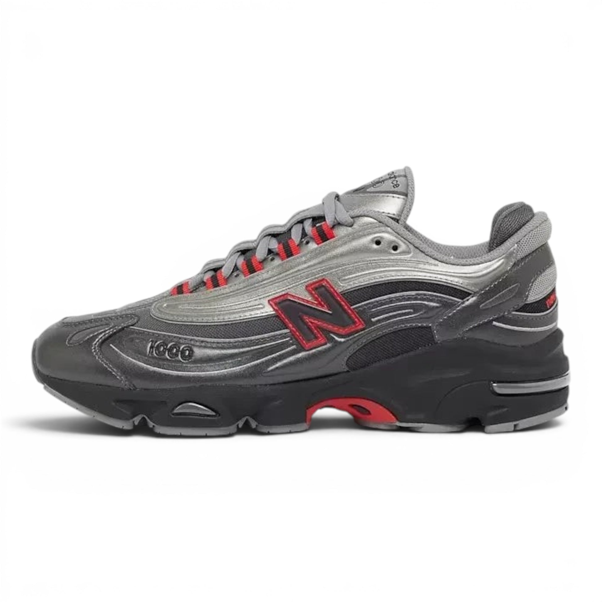 urbanstyle New Balance 1000 lifestyle running shoe in metallic silver and dark mesh with red accents and chunky sole