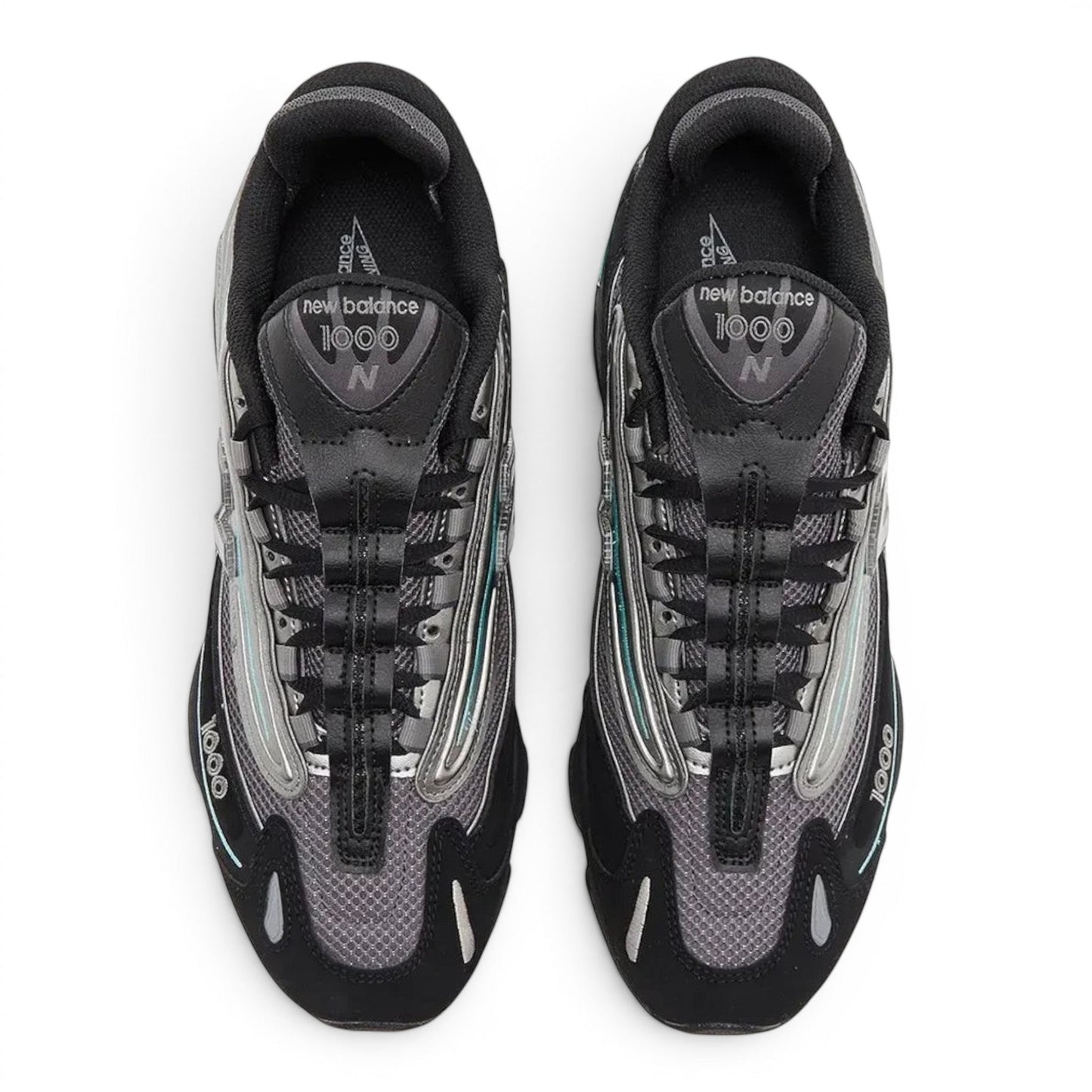 urbanstyle New Balance 1000 lifestyle sneakers in black and metallic silver with teal accents and mesh upper.