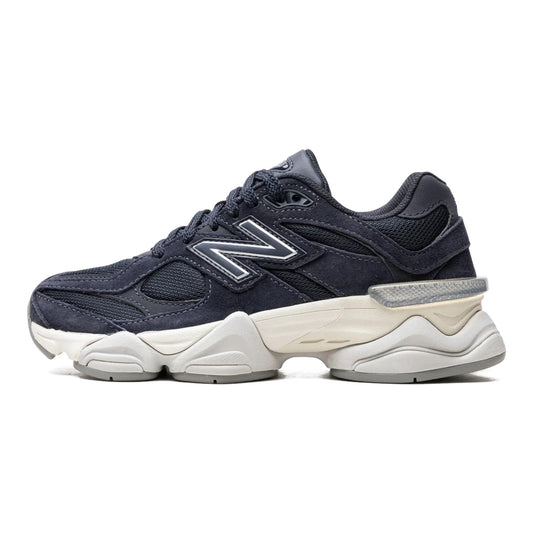Urbanstyle navy blue New Balance 9060 suede and mesh sneakers with chunky sole and N logo.