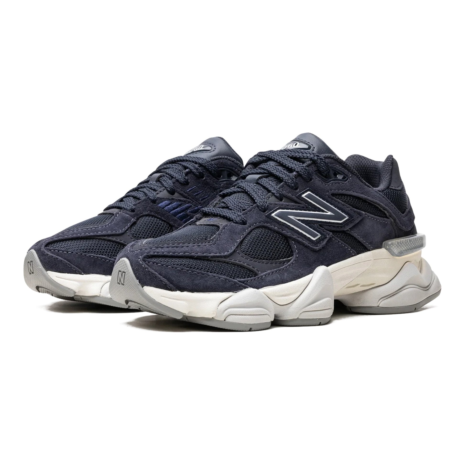 Urbanstyle New Balance 9060 navy blue suede and mesh sneakers with chunky sole and iconic N logo.