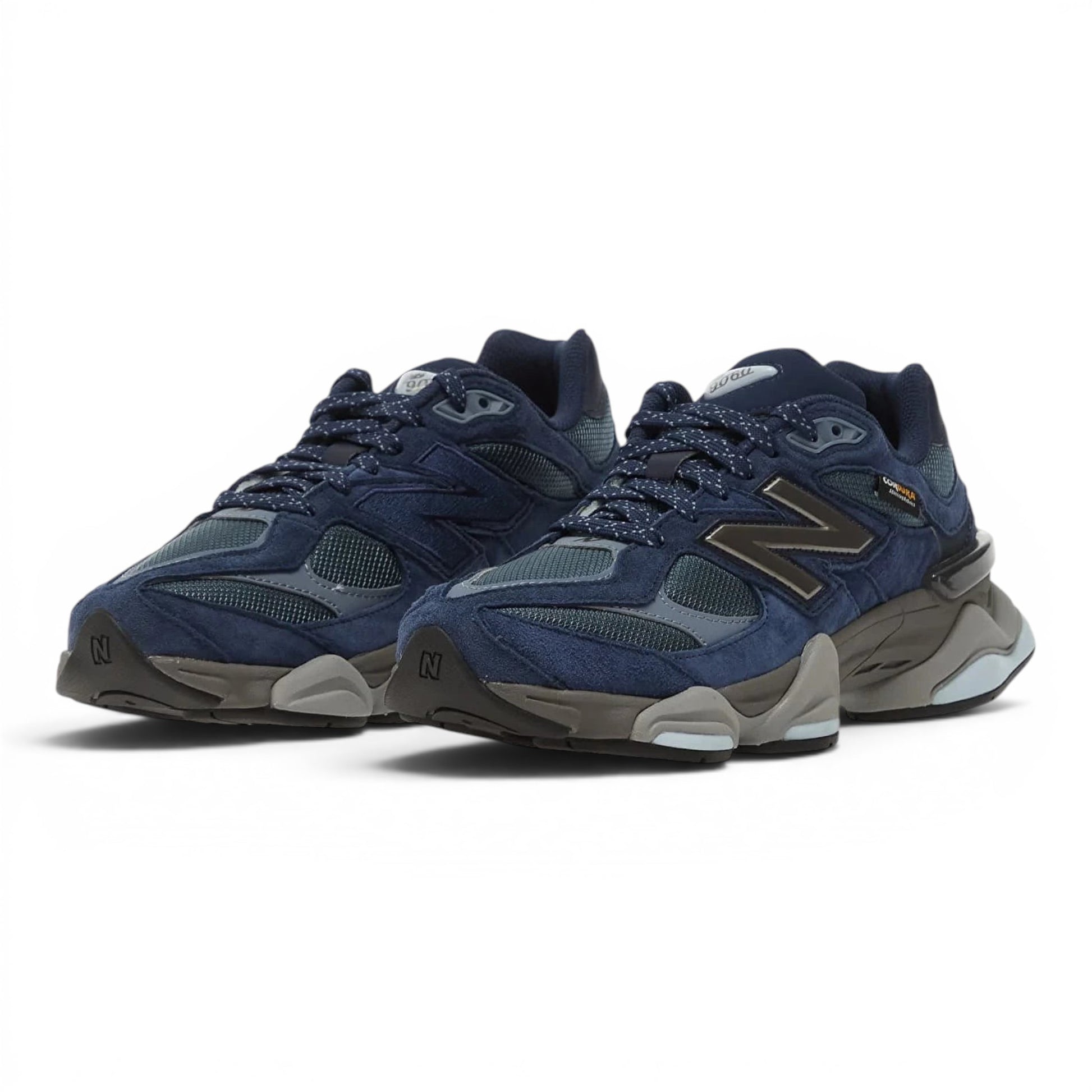 urbanstyle New Balance 9060 navy blue suede and mesh sneakers with chunky midsole and CORDURA fabric detailing.