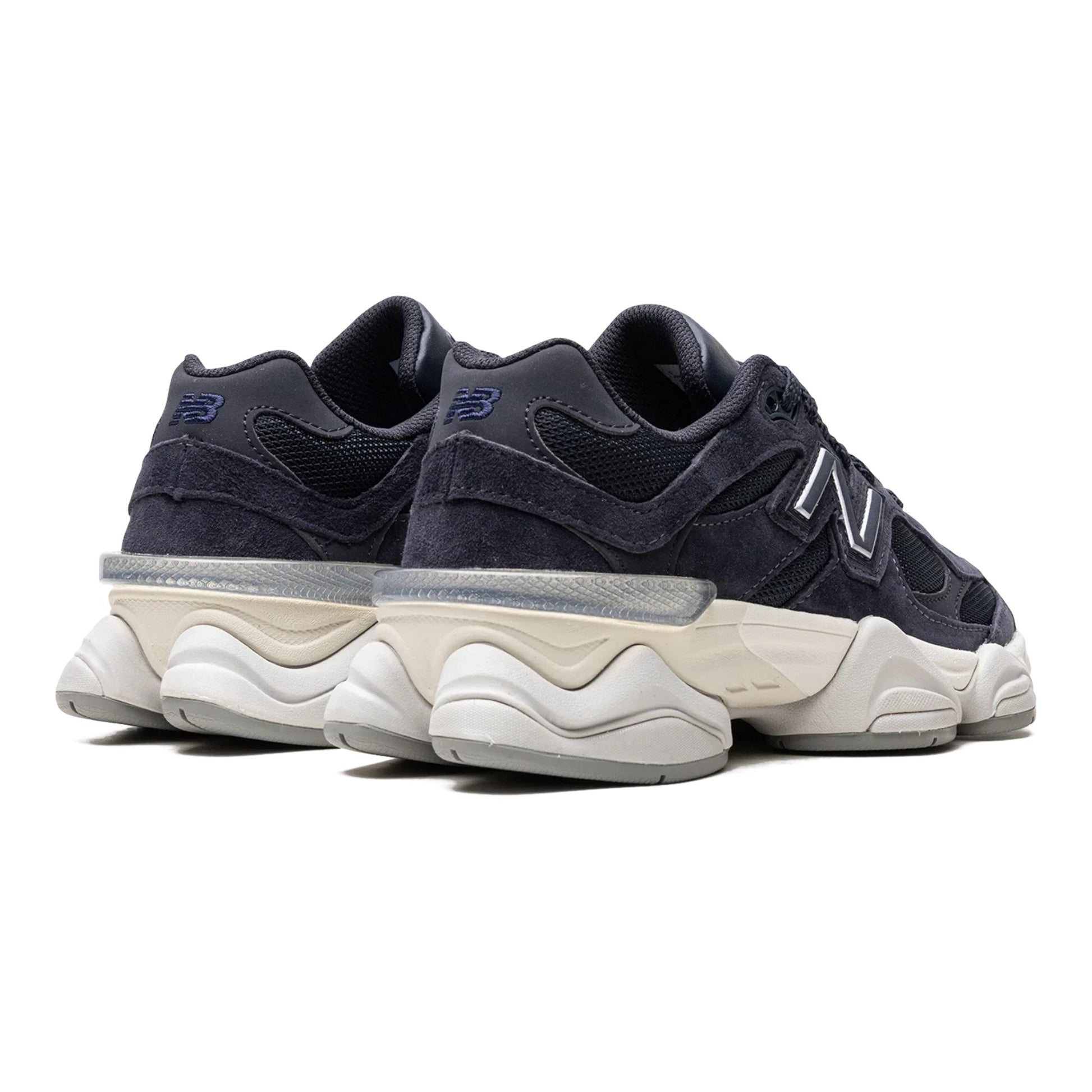 Urbanstyle navy blue New Balance 9060 suede and mesh sneakers with chunky sole and iconic N logo.
