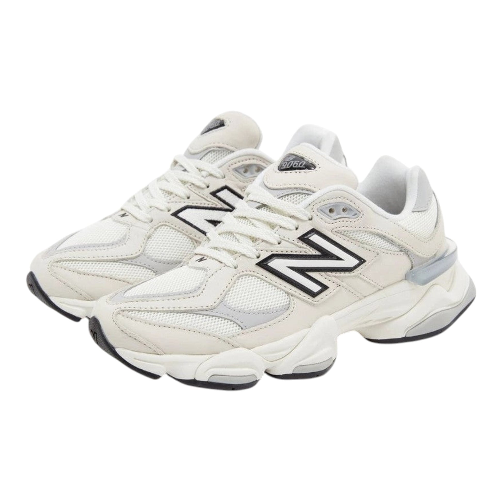 Urbanstyle New Balance 9060 off-white and grey leather and mesh sneakers with chunky sole and iconic N logo.