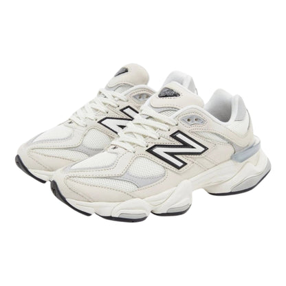 Urbanstyle New Balance 9060 off-white and grey leather and mesh sneakers with chunky sole and iconic N logo.