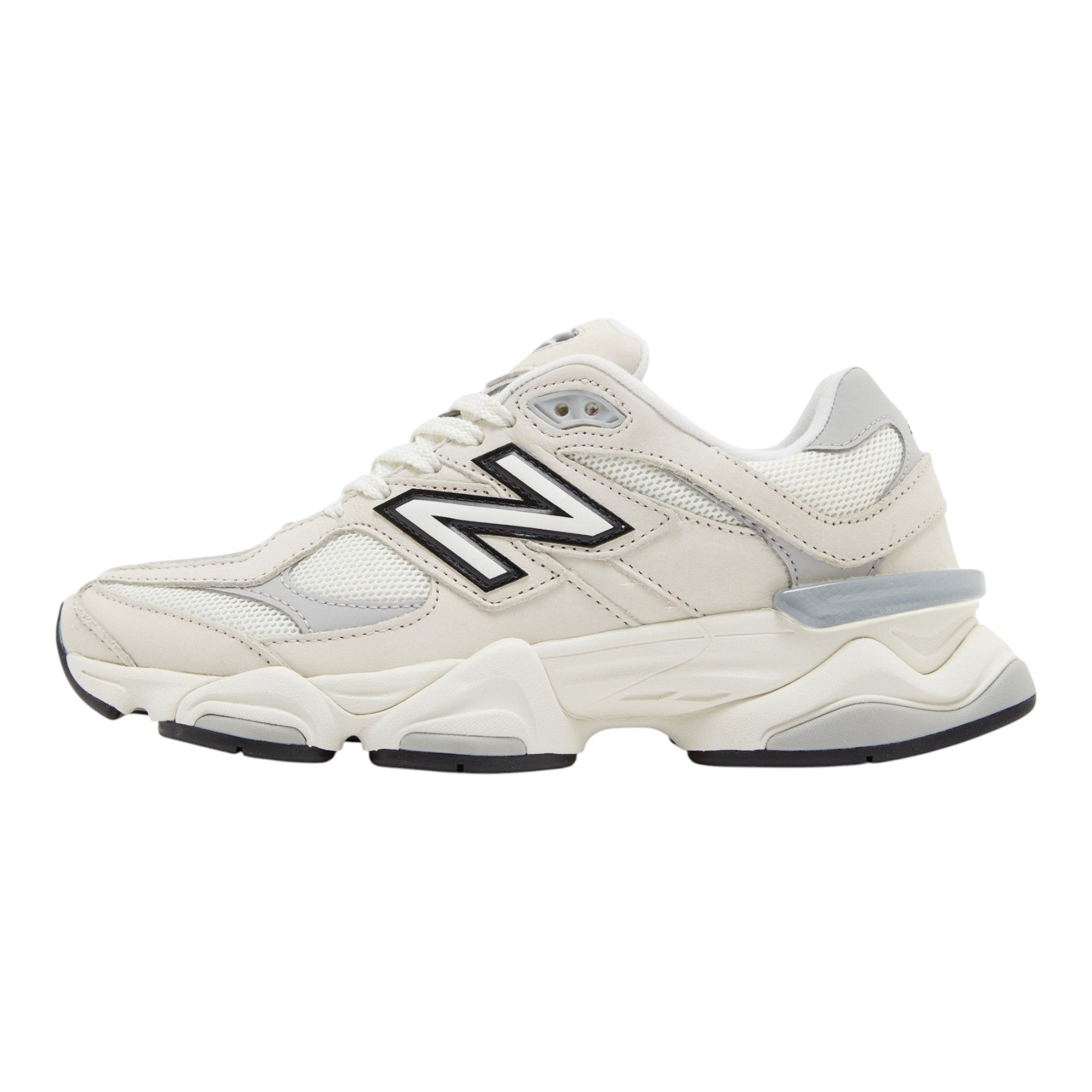 Urbanstyle New Balance 9060 off-white and grey leather and mesh sneakers with chunky sole and N logo.