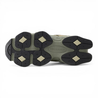 Urbanstyle New Balance 9060 olive green suede and mesh sneakers with chunky sole.
