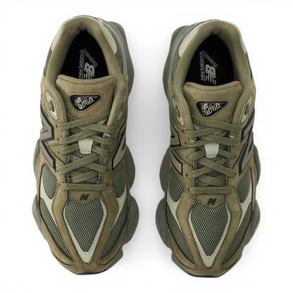 Urbanstyle New Balance 9060 olive green suede and mesh sneakers with chunky sole and N logo.