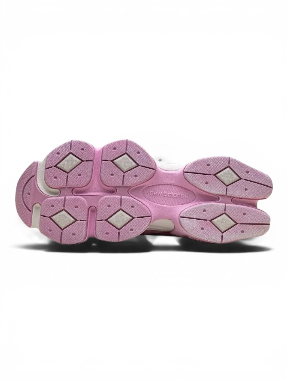 urbanstyle New Balance 9060 pink sneaker outsole with a chunky, sculpted rubber tread pattern for high traction.