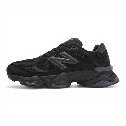 Urbanstyle New Balance 9060 Triple Black sneakers with mesh and suede upper, and chunky sole.