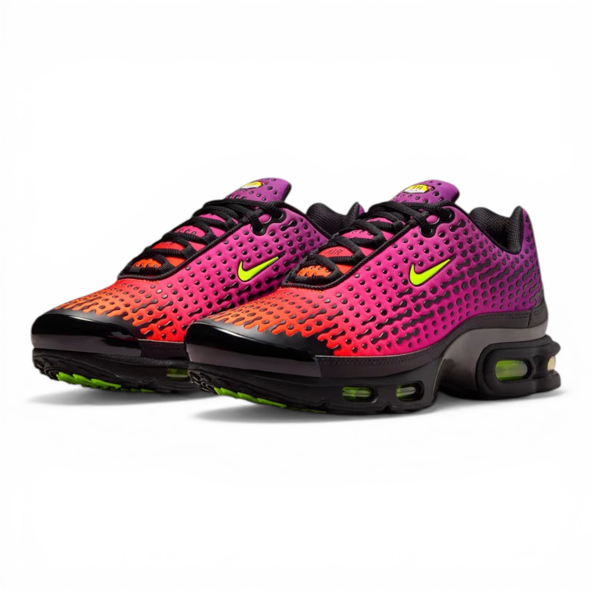 Urbanstyle Nike Air Max Plus sneakers with pink, purple, orange gradient mesh upper and neon green Swoosh.
