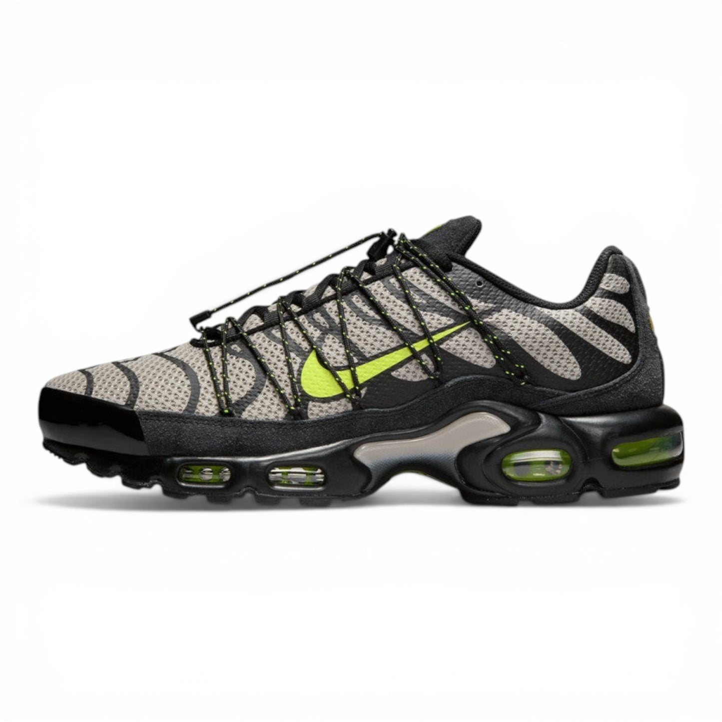 Urbanstyle Nike Air Max Plus sneakers with grey and black tiger stripes, volt green accents, and cushioned sole.