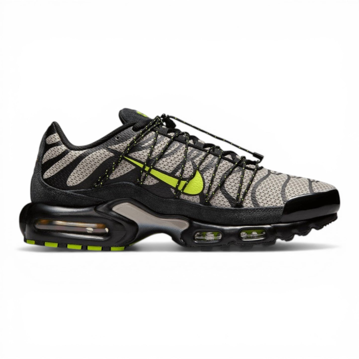 Urbanstyle Nike Air Max Plus Tn Se sneakers in grey, black, and volt green with tiger stripes and cushioned sole.