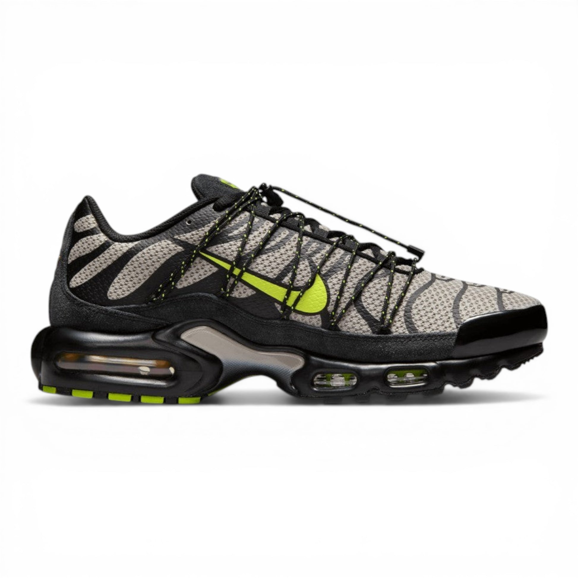 Urbanstyle Nike Air Max Plus Tn Se sneakers in grey, black, and volt green with tiger stripes and cushioned sole.