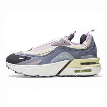 Urbanstyle Women's Nike Air Max Verona sneaker in grey, lavender, and pale yellow with chunky sole and visible air cushioning.