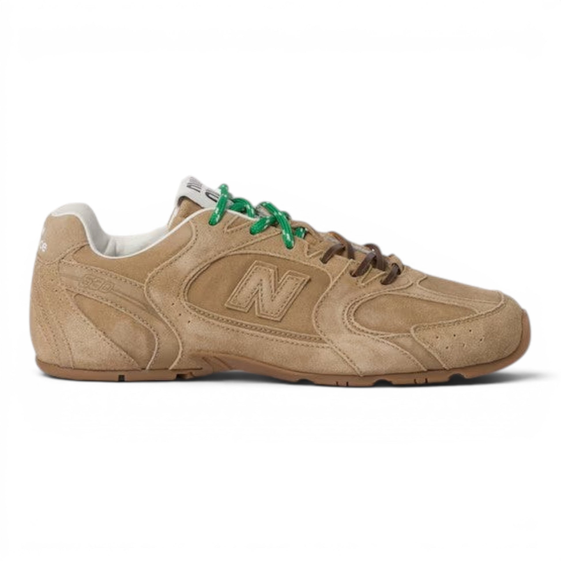 Urbanstyle tan suede low-top athletic sneakers with green and brown laces and a rubber sole.